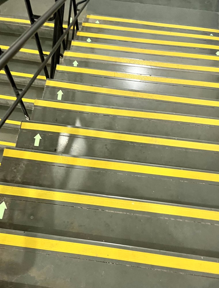 3M Safety-Walk yellow anti-skid tape installed on site steps by Ekdant Enterprises